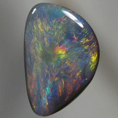 SOLID BLACK OPAL Golden fire, red, copper and green over blue purple